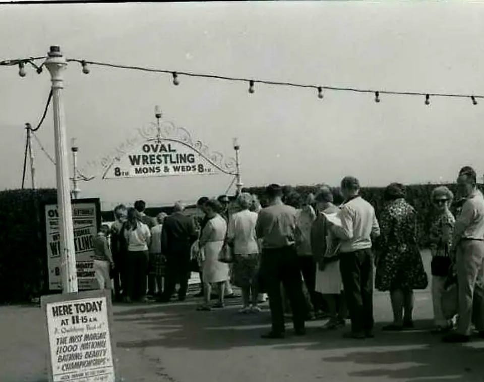 Queuing for tickets at the wrestling gates